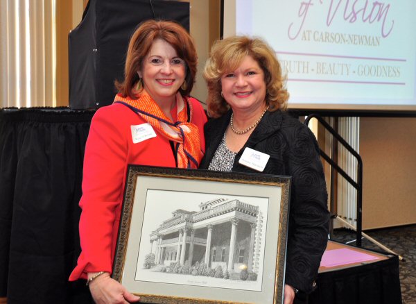 Carson-Newman’s Kay O’Brien, left, presents Donna Harmon with the first WOV Distinguished Service Award