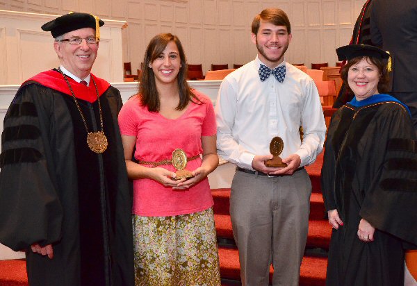 Carson-Newman seniors Abigail Parker, center left, and Curtis Atkins, center right, receive the University’s Algernon Sydney Sullivan Awards from President Randall O’Brien, and Executive Vice President and Provost Kina Mallard.  The two were celebrated during C-N’s Honors Convocation.