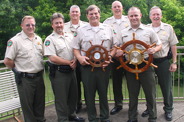 TWRA BOATING OFFICERS OF THE YEAR --- Tommy Stockling (left) and Nick Luper are with their respective awards after being introduced as the Tennessee Wildlife Resources Agency part-time Boating Officer and Boating Officer of the Year for 2012. Both officers serve the TWRA in Region III’s District 31. The officers were presented the awards at the May meeting of the Tennessee Wildlife Resources Commission. Also pictured are (from left) District 31 Lt. Tim Singleton, District 31 Cpt. Roy Cannon, Region III Maj. CJ Jaynes, Boating and Law Enforcement Division Chief Darren Rider, and Asst. Boating and Law Enforcement Chief Glenn Moates.