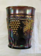 This Amethyst Colored Northwood Carnival Glass Grape and Cable Pattern tumbler is just one of the beautiful glassware items found in Rachel's Attic.