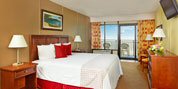 The rooms are cozy and each room features a private balcony overlooking the Atlantic Ocean