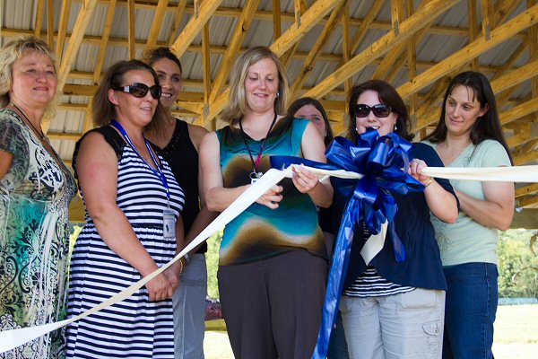 Ribbon Cutting signifying the completion of the new pavilion built by the Piedmont PTO - Staff Photo by Robin McMahon