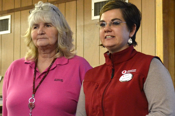 L/R - Red Cross Volunteer Pauline Pusey and Red Cross Staff Member Naomi Caudle speaking to potential volunteers at Jefferson City Public Library-Staff Photo by Sara May