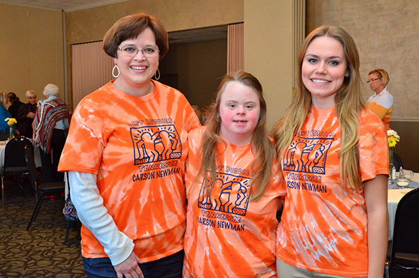 Carson-Newman’s Dr. Kim Hawkins, left, stands with Holly Newman, center, and Katie Moore at a recent Les Amies meeting on campus. The three featured guests talked to the women’s group about the University’s Best Buddies Program.