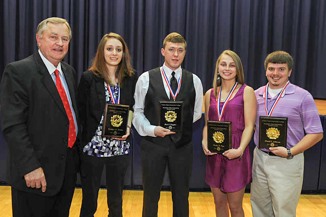 Walters State Community College presented four members of the Class of 2014 with the college’s highest honor: the President’s Outstanding Student Award. From left are Dr. Wade McCamey, president of Walters State, with recipients Katelyn Madon of Morristown; Bret Coggins of Dandridge; Karly Frye of Chuckey and David Johnson of Rutledge.