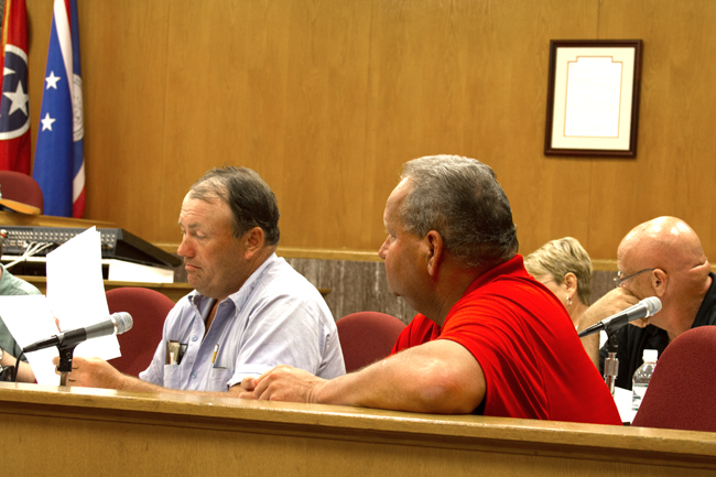 Jefferson County Commissioners John Neal Scarlett (left) and Terry Dockery (right) at Commisson meeting, June 26, 2014Staff Photo by Jeff Depew