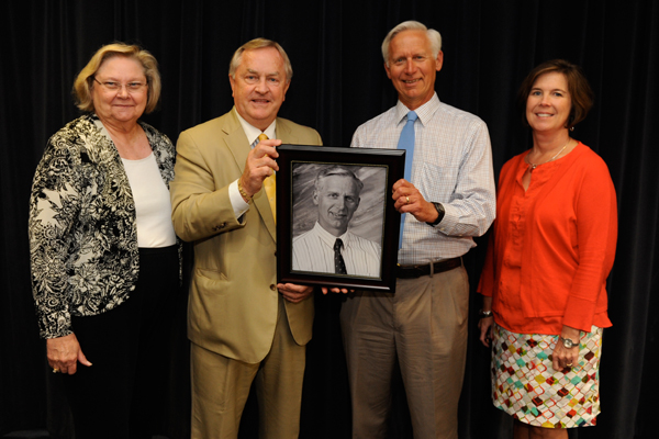 Walters State Community honored long-time business and economics professor Dr. Orville E. “Butch” Bach Jr. with the title of professor emeritus. From left are Dr. Evelyn Honaker, dean of business; Dr. Wade B. McCamey, president of Walters State; Bach; and Dr. Lori Campbell, vice president for academic affairs.