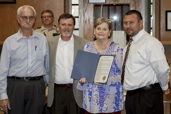 Commissioners Blevins and Eslinger present resolution to Dail's familyStaff Photo by Jake Depew