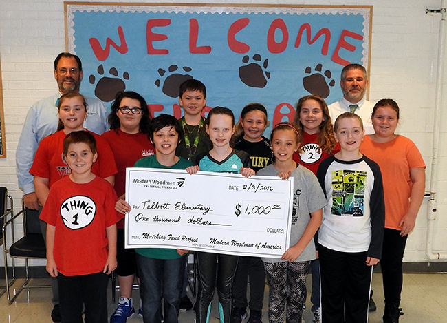 Talbott Students Receive CheckL/R Back Row: Richard Hall (MWA Rep) and Ron Overton (Principal)