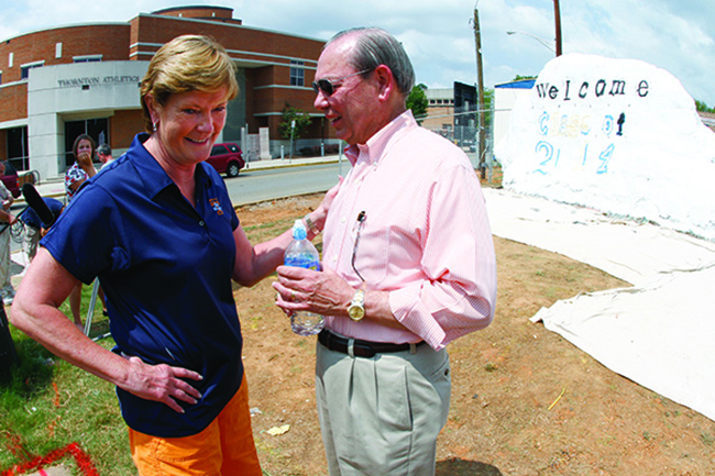 Lady Vol Coach Pat Summit chats with Chancellor Jimmy G. Cheek as they take a break from painting a a message on The Rock welcoming incoming freshman in 2010.
