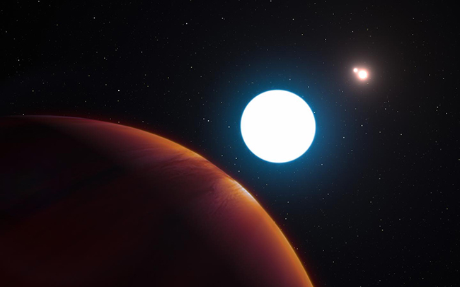 This artist's impression shows a view of the triple star system HD 131399 from close to the giant planet orbiting in the system. The planet is known as HD 131399Ab and appears at the lower-left of the picture.Located about 340 light years from Earth in the constellation of Centaurus (The Centaur), HD 131399Ab is about 16 million years old, making it also one of the youngest exoplanets discovered to date, and one of very few directly imaged planets. With a temperature of around 580 degrees Celsius and having an estimated mass of four Jupiter masses, it is also one of the coldest and least massive directly imaged exoplanets.ESO/L. Calcada
