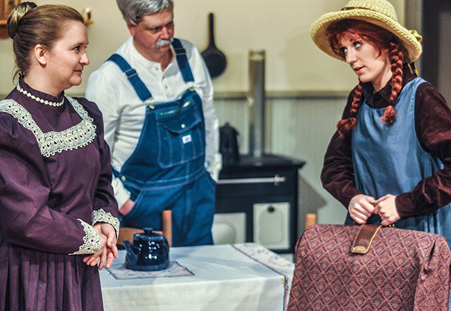 Matthew and Marilla welcome Anne to Green GablesMindy Williams as Marilla, Mark McConkey as Matthew, MacKenzie Price Myers as Anne.  Photo by Loveday Images