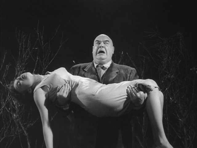 Tor Johnson as a zombie with his victim in cult movie Plan 9 from Outer Space (1959)
